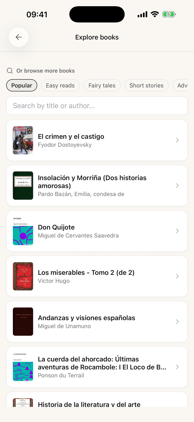 The Explore books screen listing free classics in Spanish — Crimen y castigo, Don Quijote, Los miserables — with category filters for popular, easy reads, fairy tales and short stories.